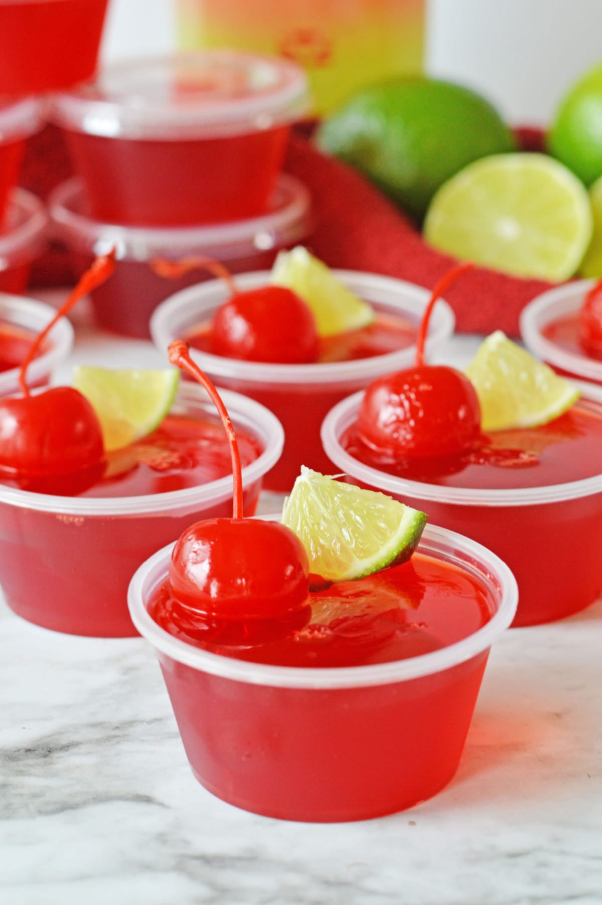 Cherry Limeade Jello shots on marble counter