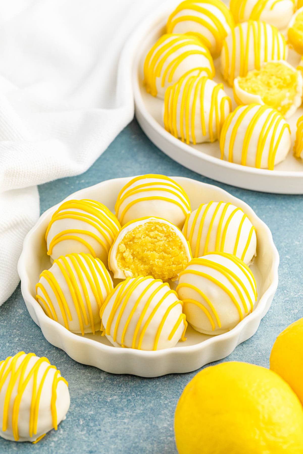 Lemon cake balls in white tart bowl