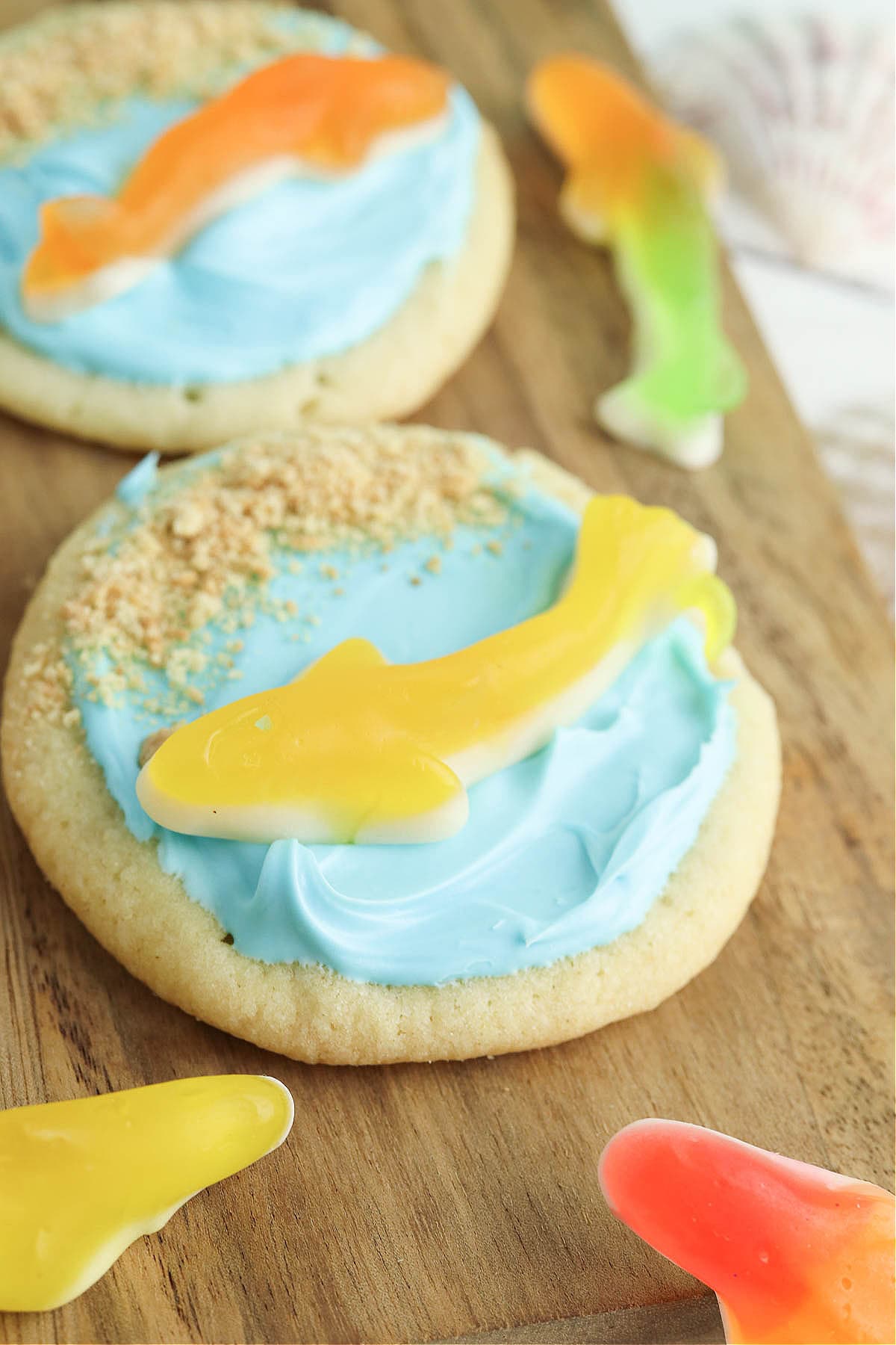 Yellow gummy shark on sugar cookie