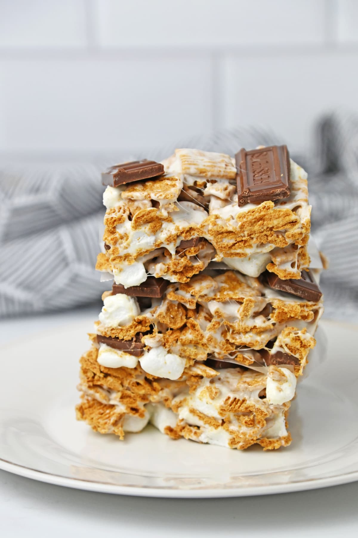 S'mores bars stacked on white plate