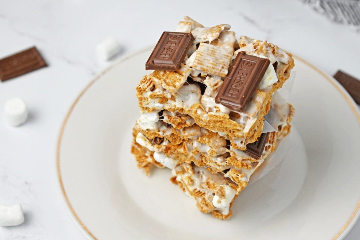 Golden Grahams smores bars stacked on plate