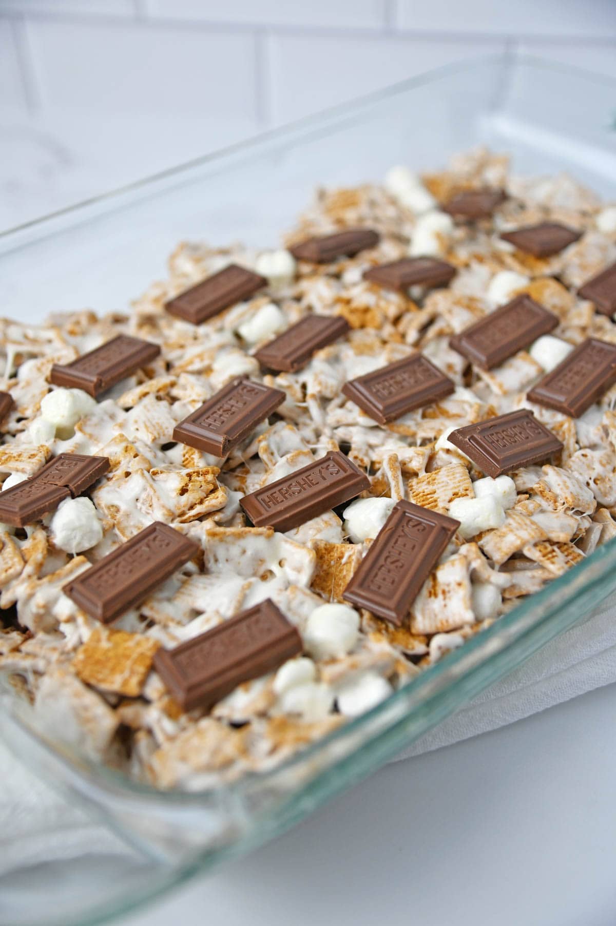 Cereal mixture topped with Hershey's chocolate squares