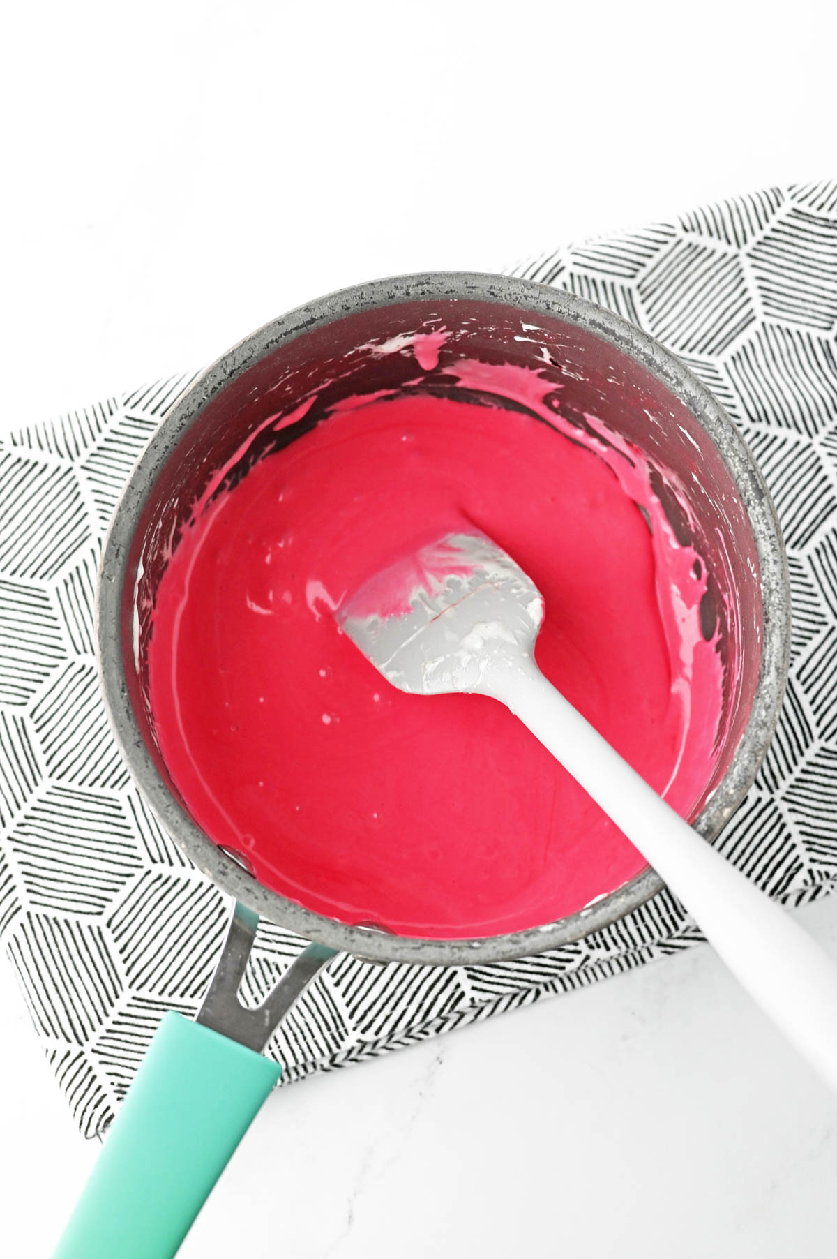 Red food coloring added to melted marshmallows