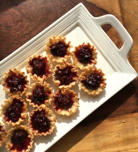 Cherry brie cups on tray