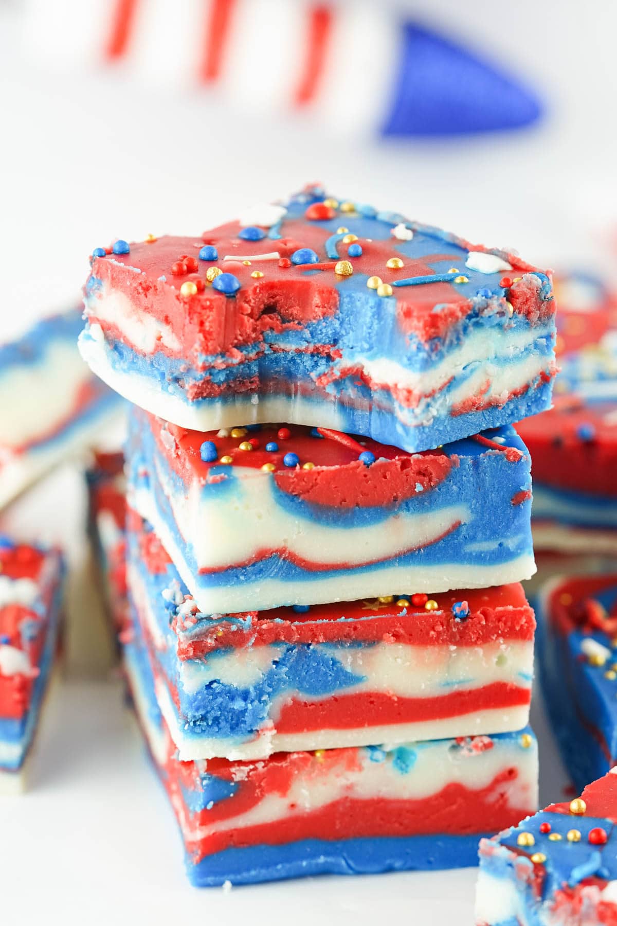 Red white and blue fudge with a bite taken out