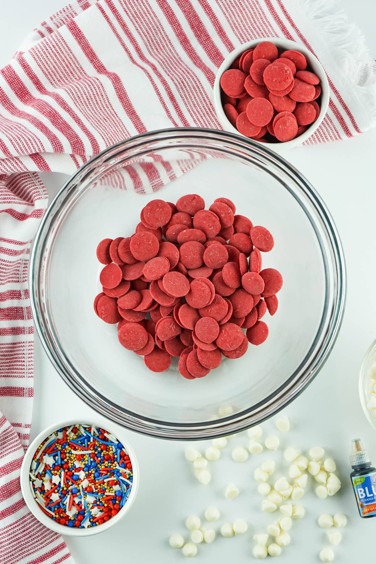 Red candy melts in glass mixing bowl