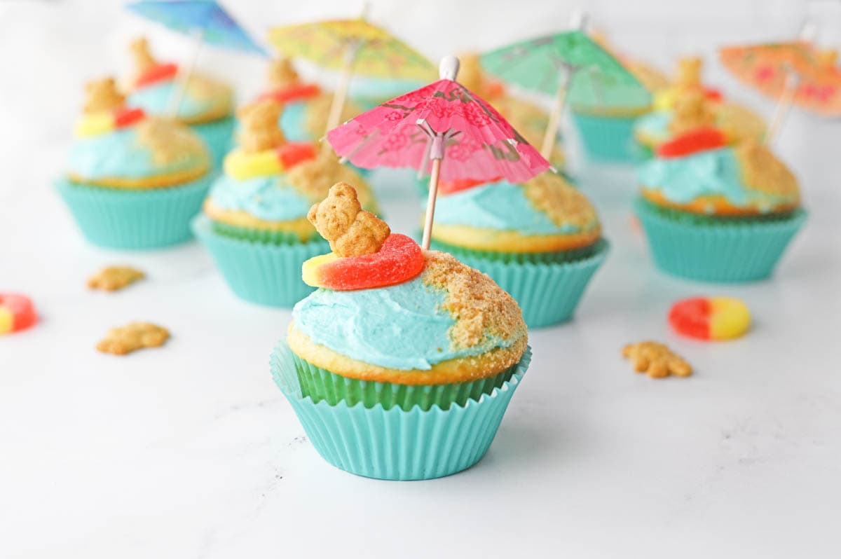 Beach cupcake with pink umbrella