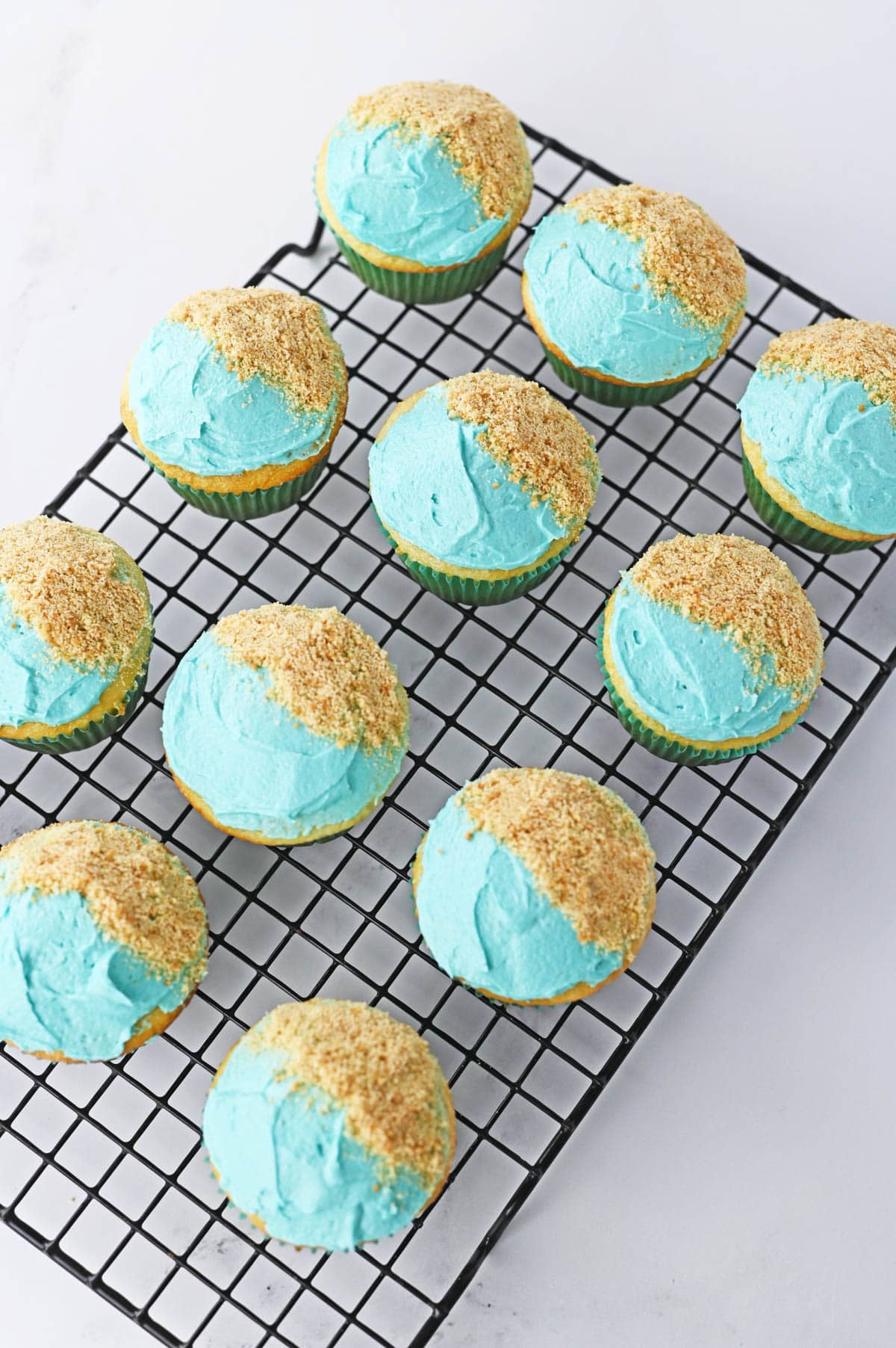 Crushed Nilla Wafers and blue frosting on cupcakes
