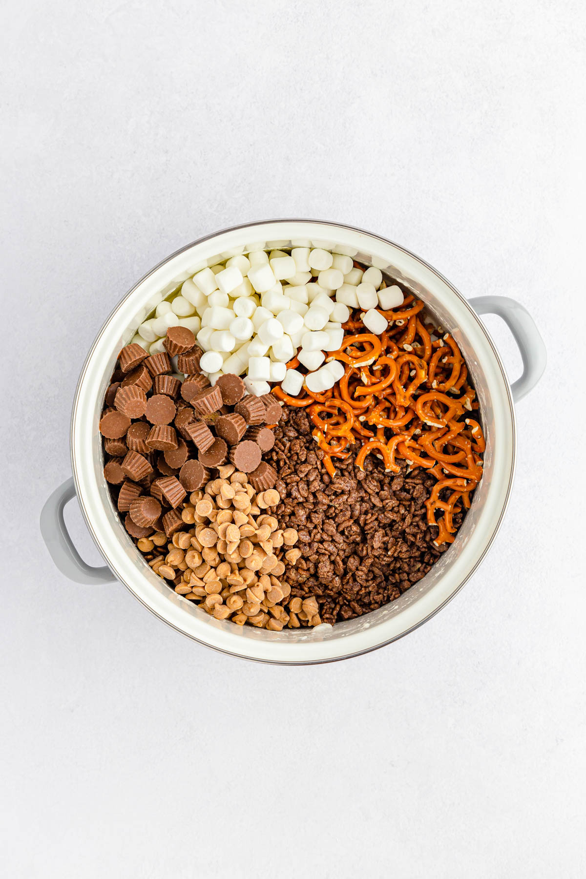 Ingredients for cocoa krispie treats in pan