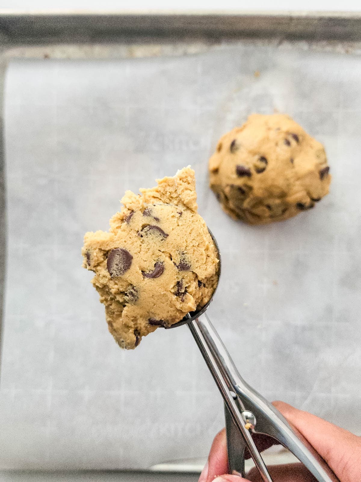 Chocolate chip cookie dough in cookie scoop