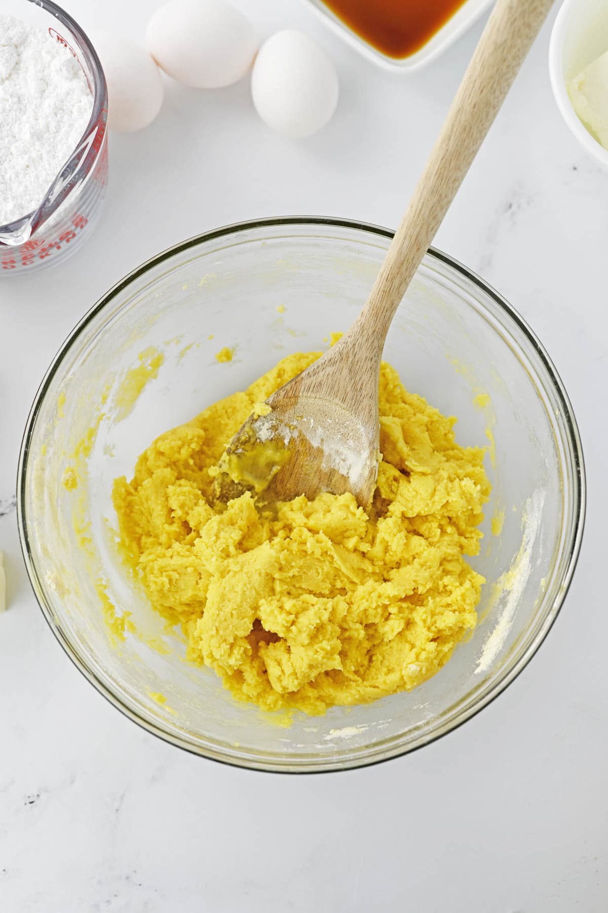 Cake mix with butter and egg in bowl