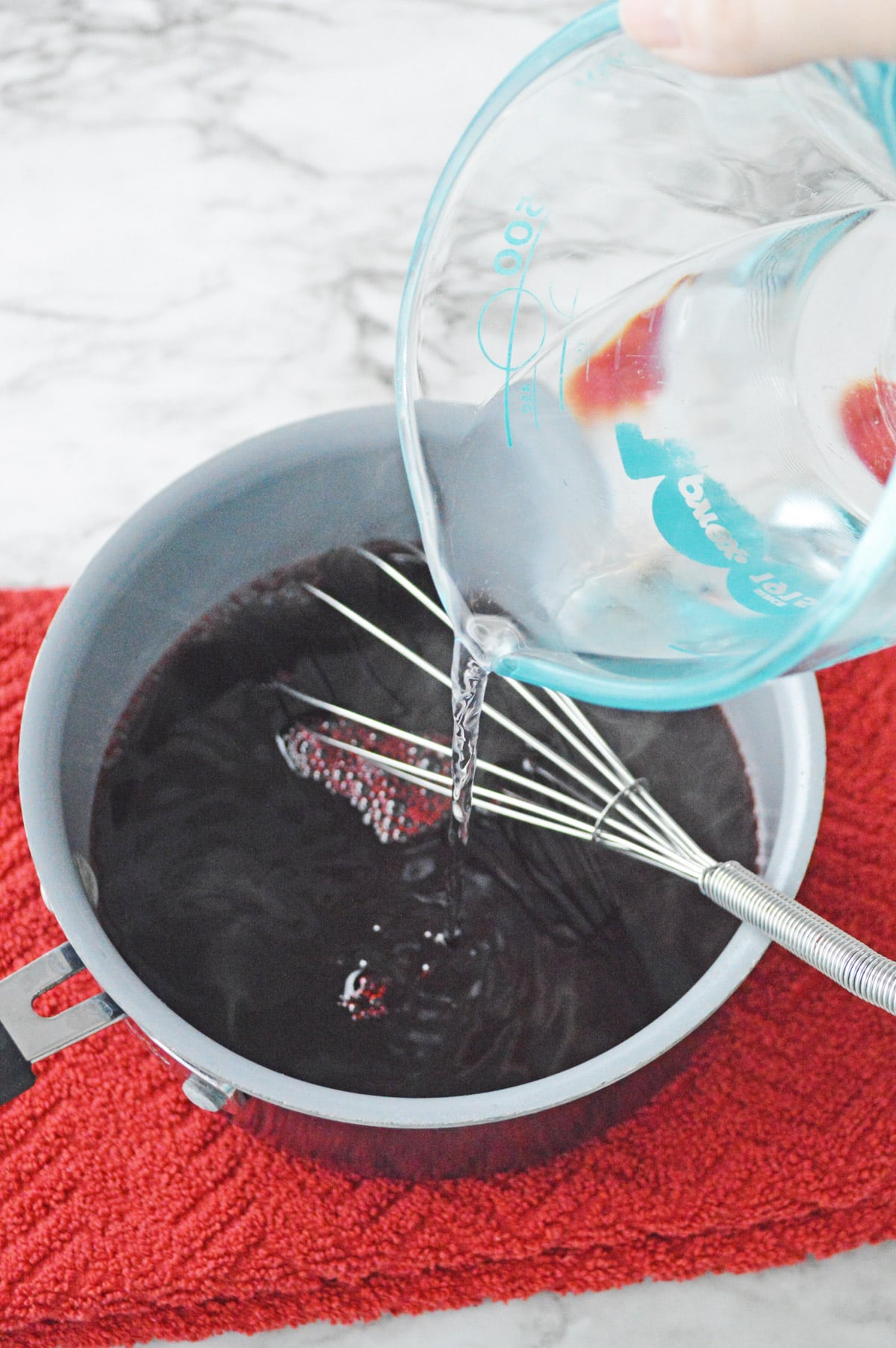 Adding water to jello mix