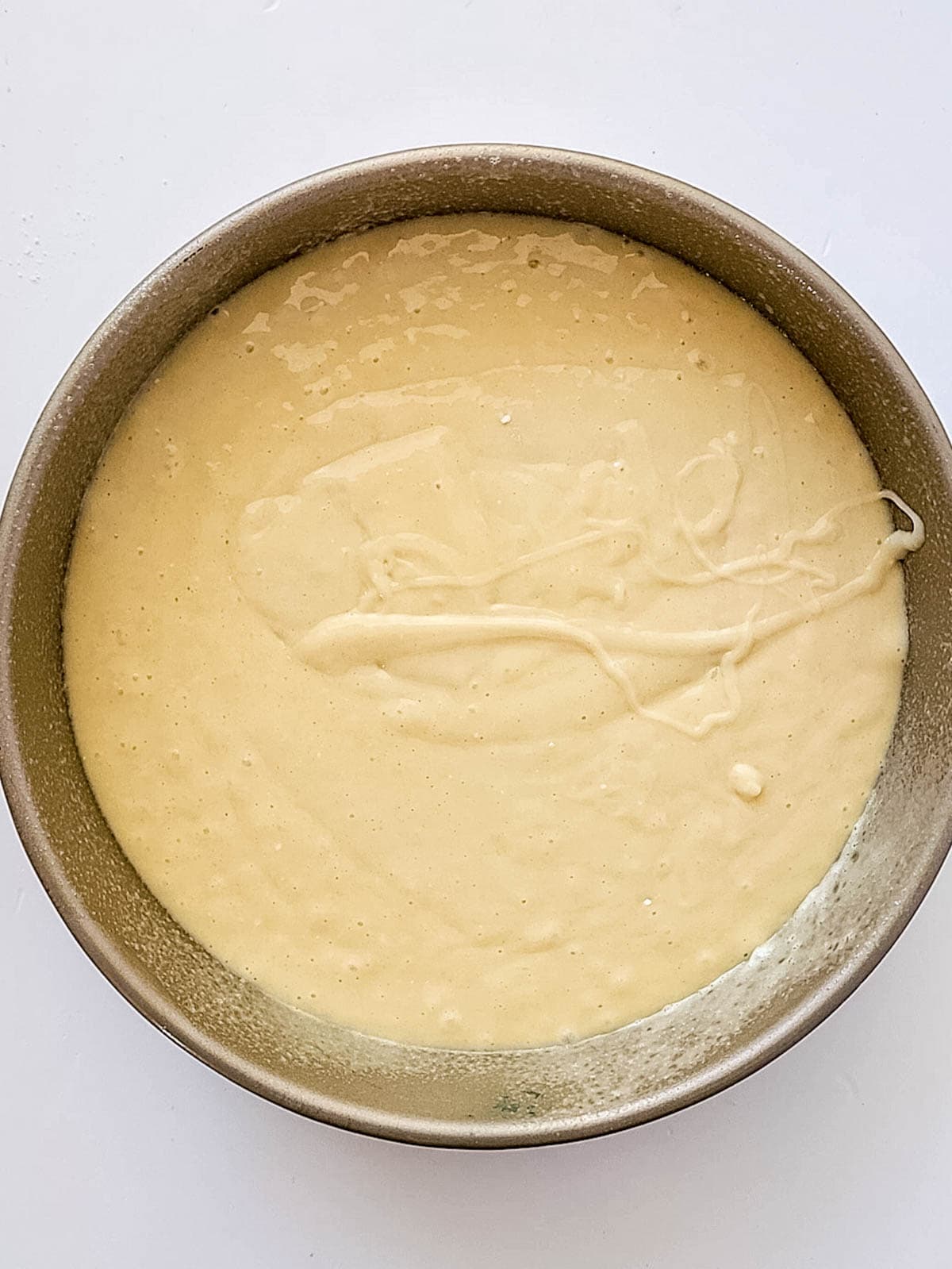 Cake batter in cake pan