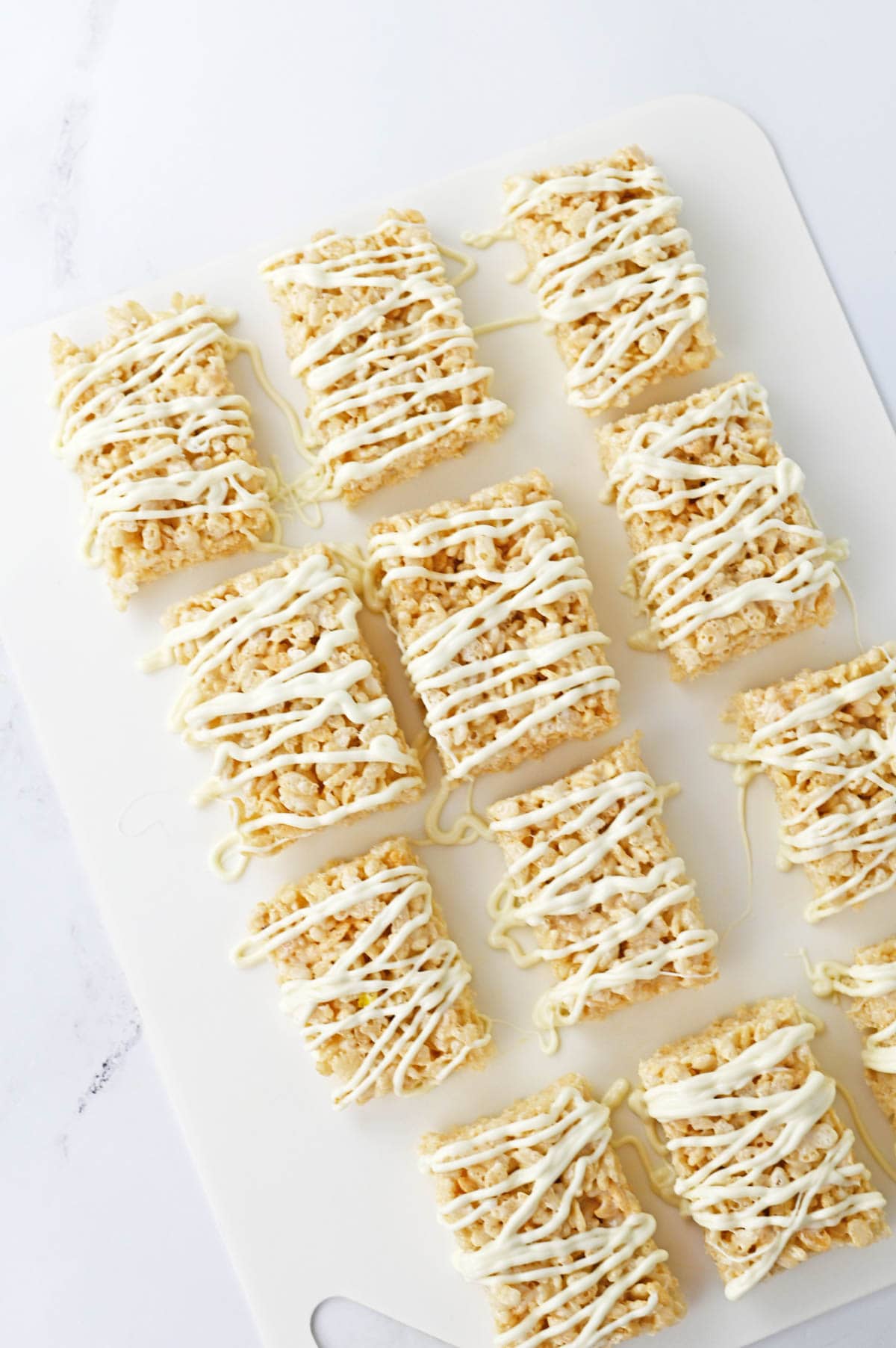 White chocolate drizzled over rice krispie treats