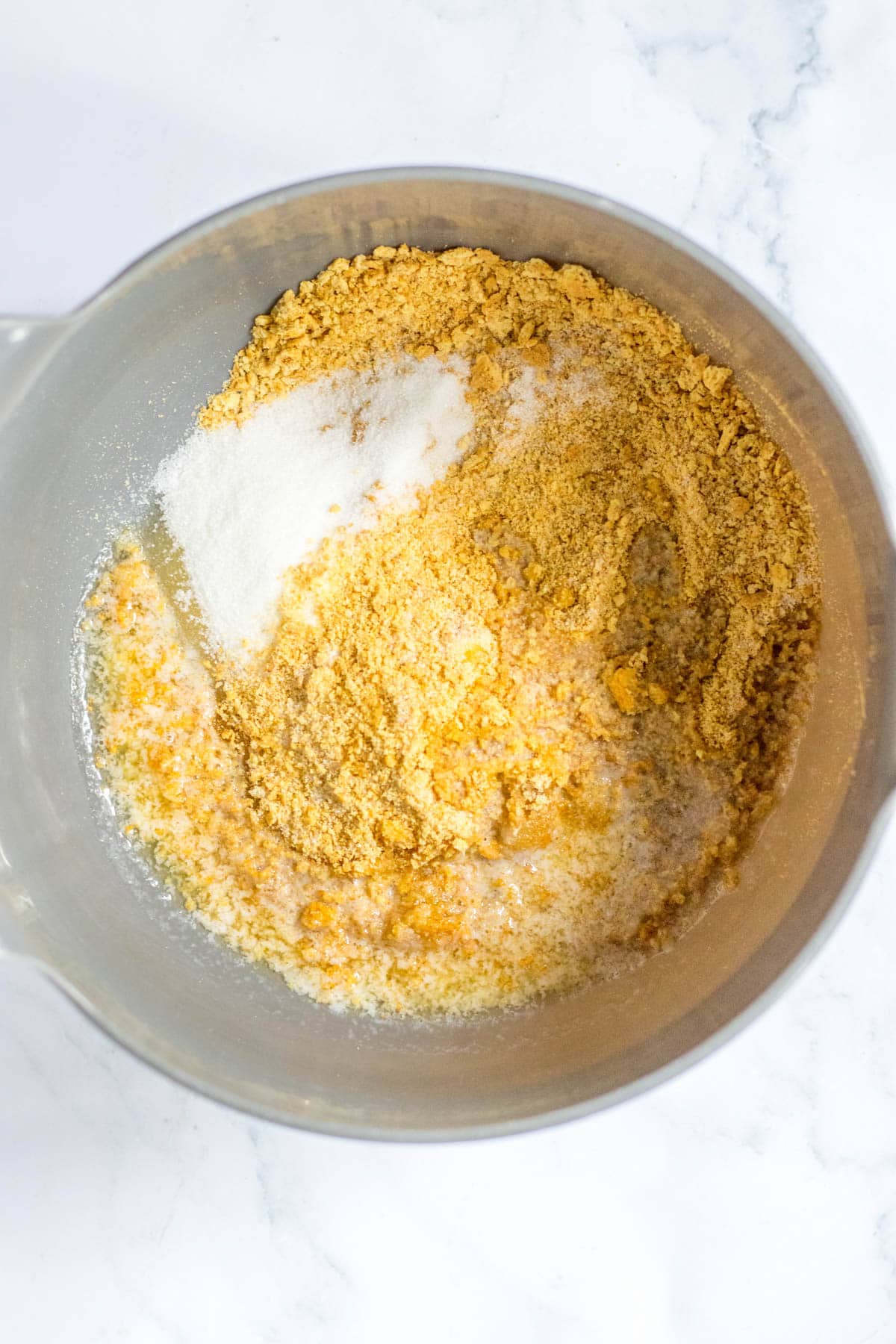 Graham cracker crumbs, sugar and butter in mixing bowl