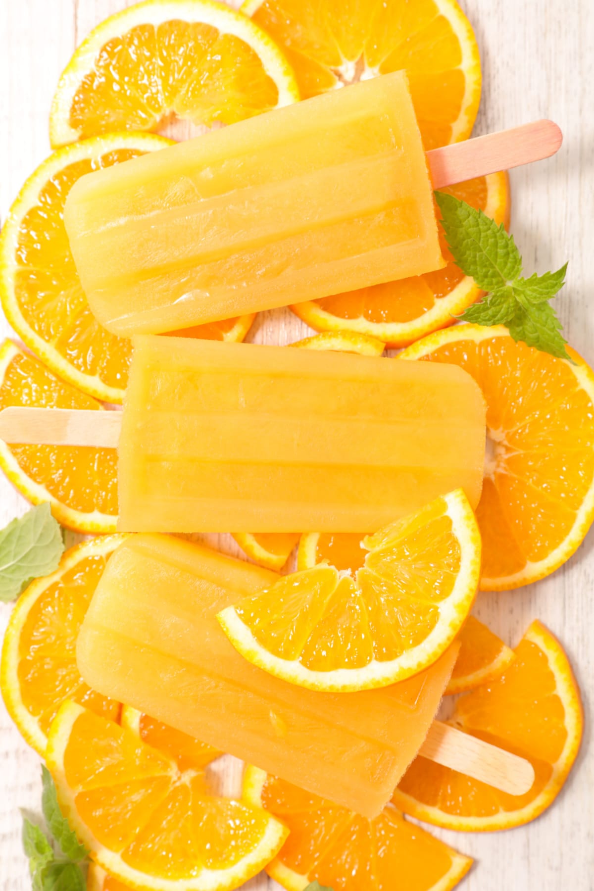 Orange Popsicles with orange slices