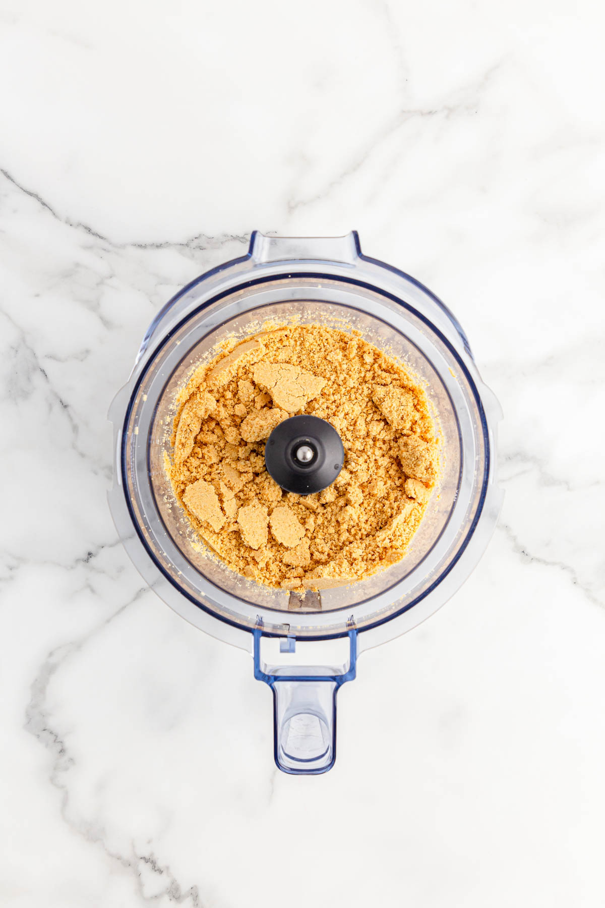 Golden Oreo cookies in food processor