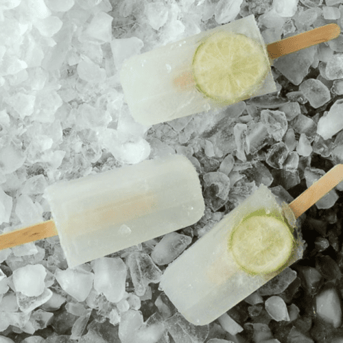 Clear boozy Popsicles with lime inside