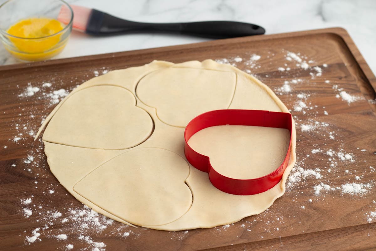 Cutting heart shapes out of pie crust