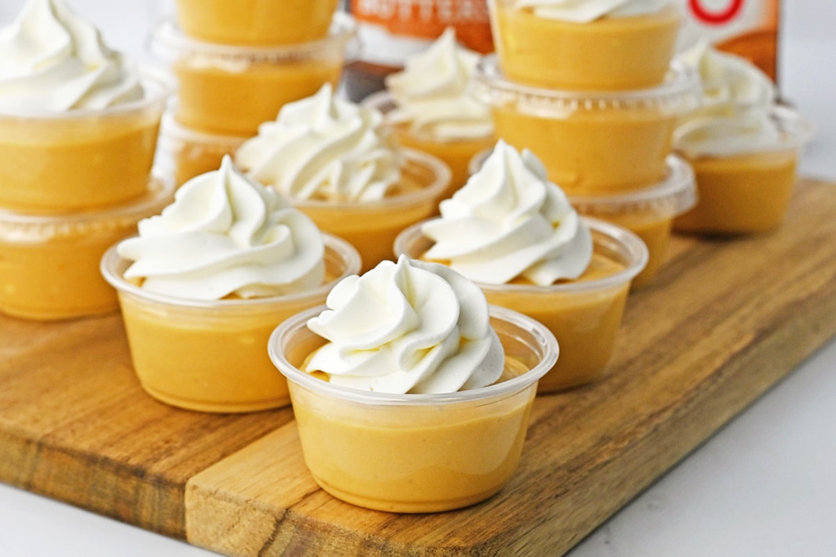 Butterscotch pudding shots with whipped cream