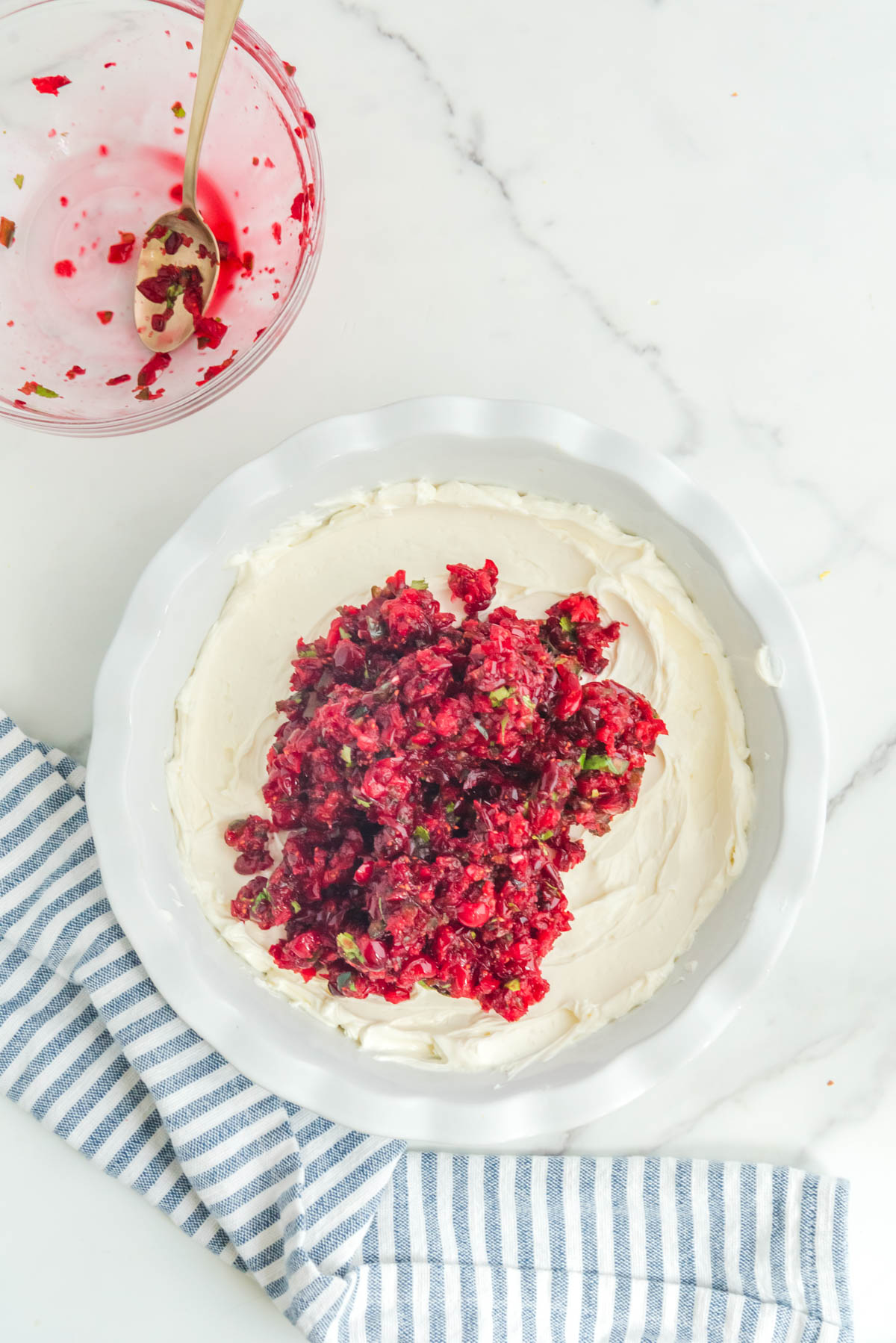 Cranberry mixture poured over cream cheese