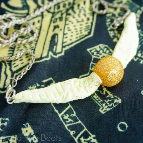 Golden snitch necklace