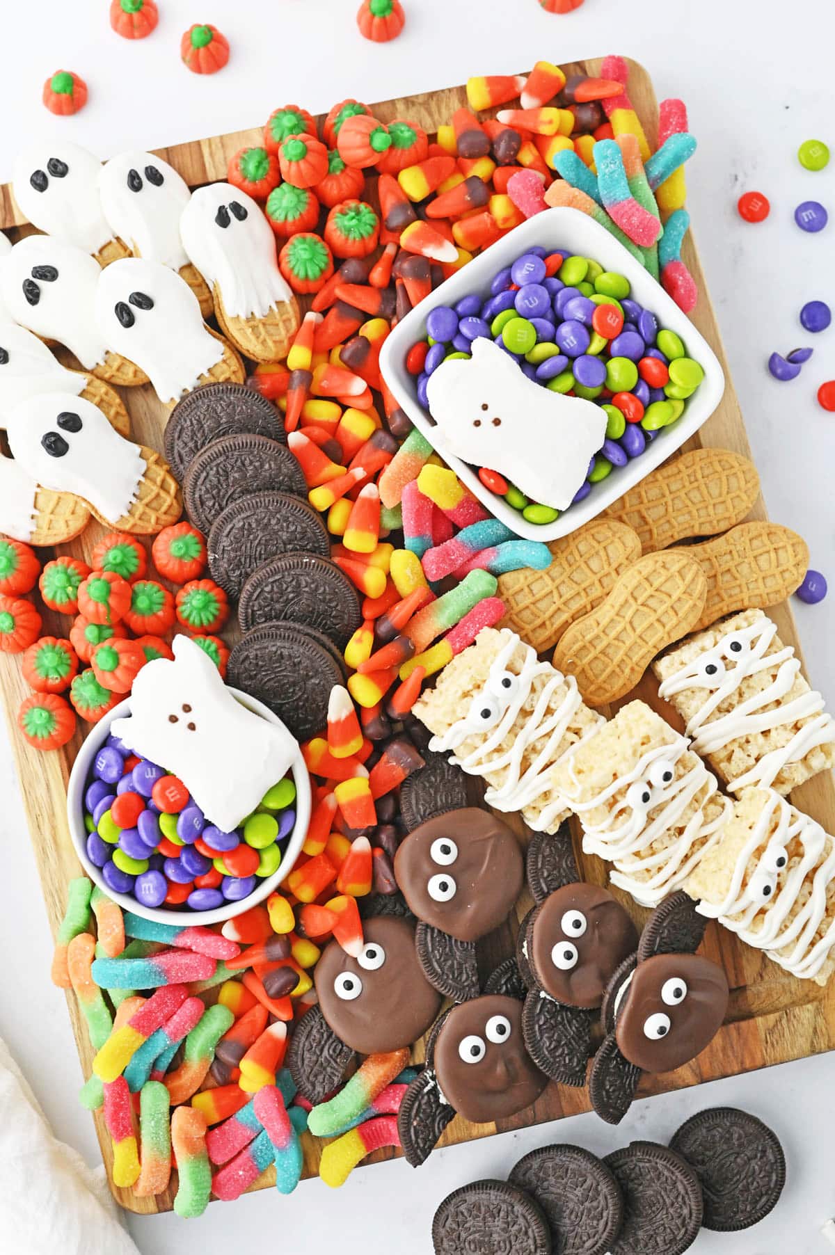 Halloween snack board with edible ghosts, bats and mummies