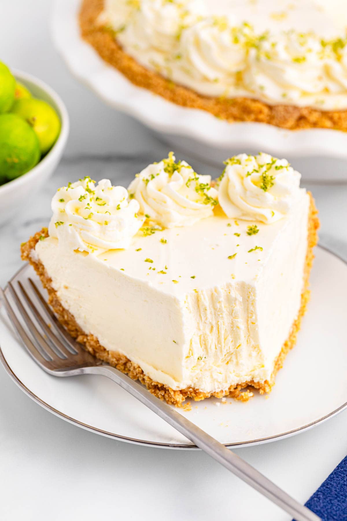 Key lime pie with a piece bitten off