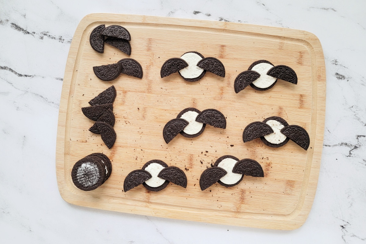 Oreo pieces attached to an Oreo to look like bat wings