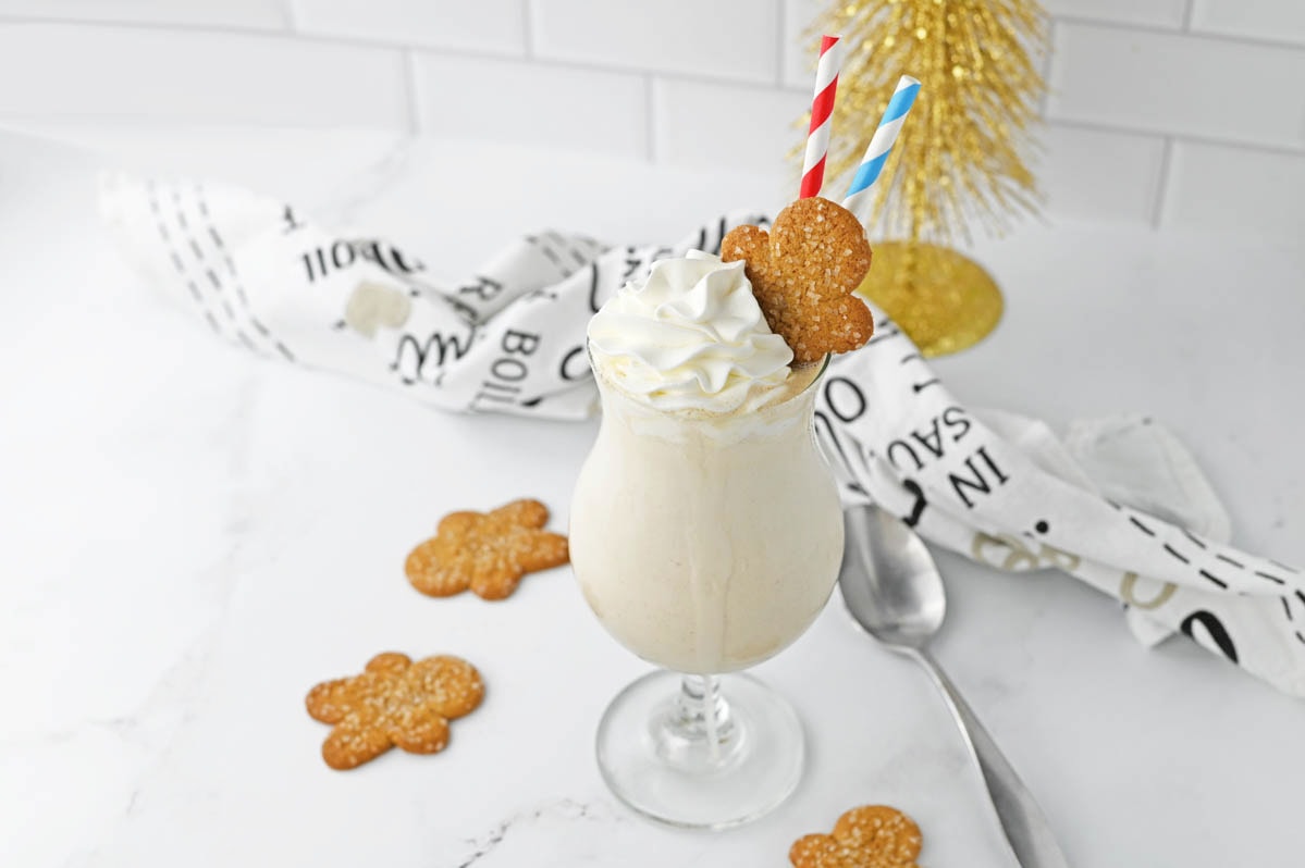 Gingerbread milkshake with whipped cream and gingerbread cookie