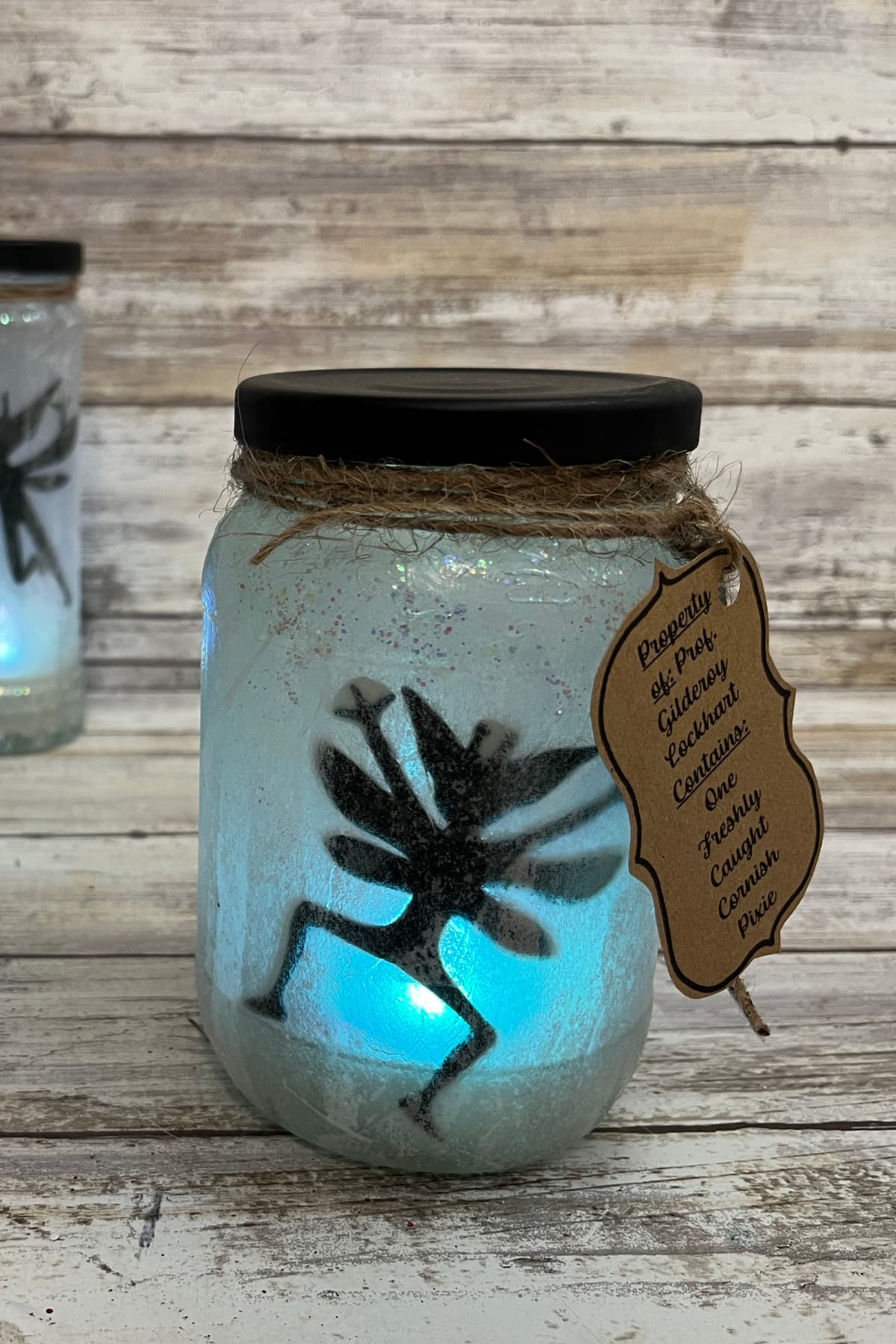 Cornish pixie jar with blue light