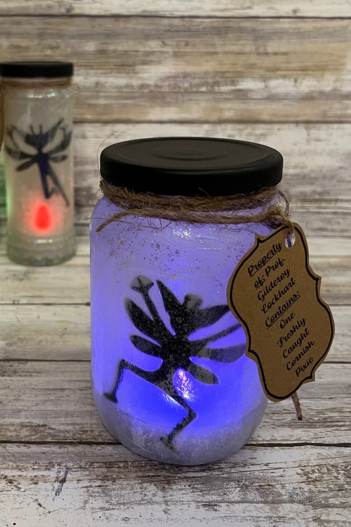 Cornish pixie jar with purple light