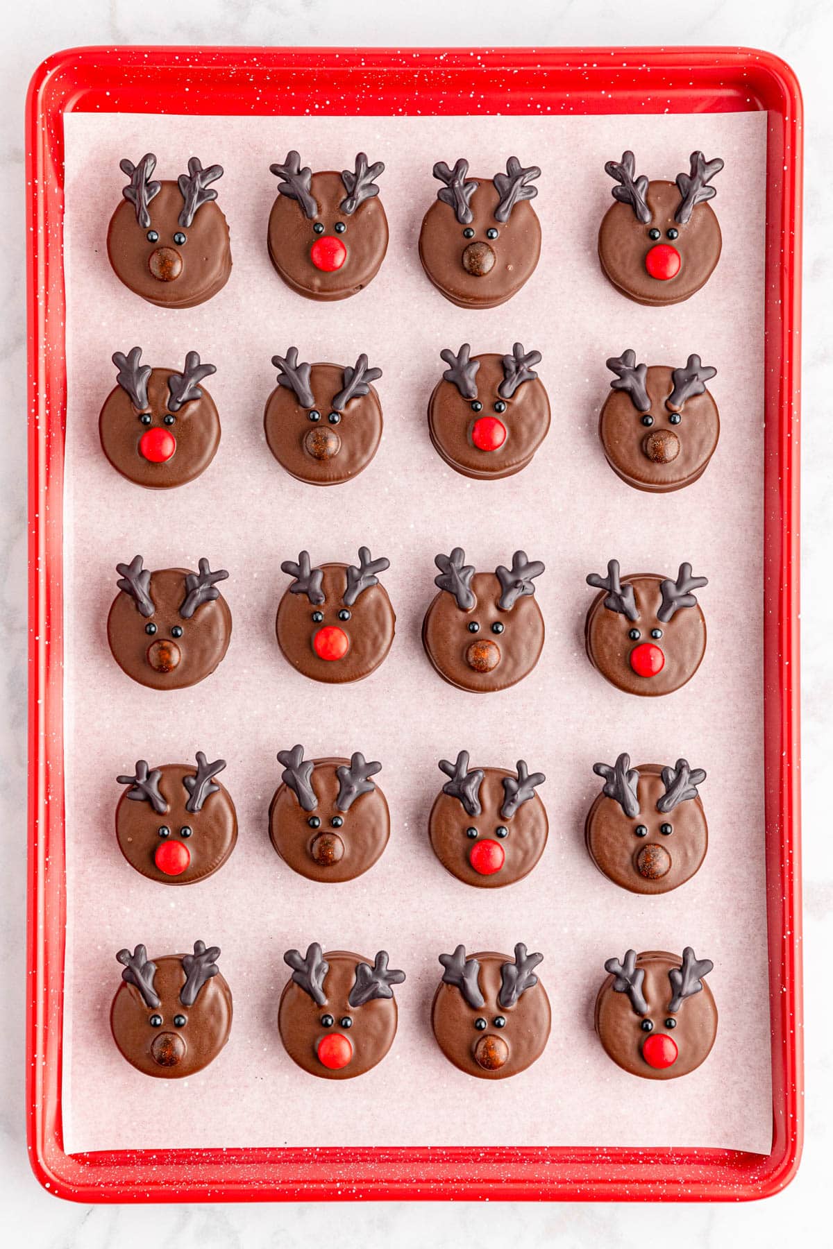 Chocolate reindeer heads on a tray.