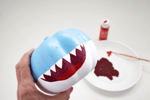Red tongue painted on shark pumpkin