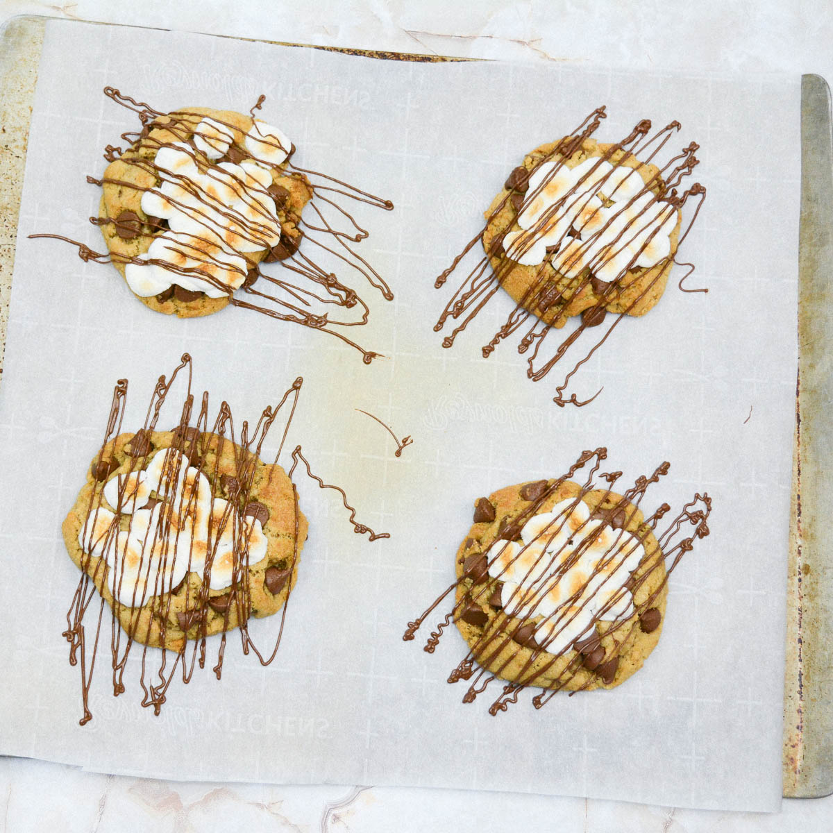 S'mores cookies drizzled with chocolate
