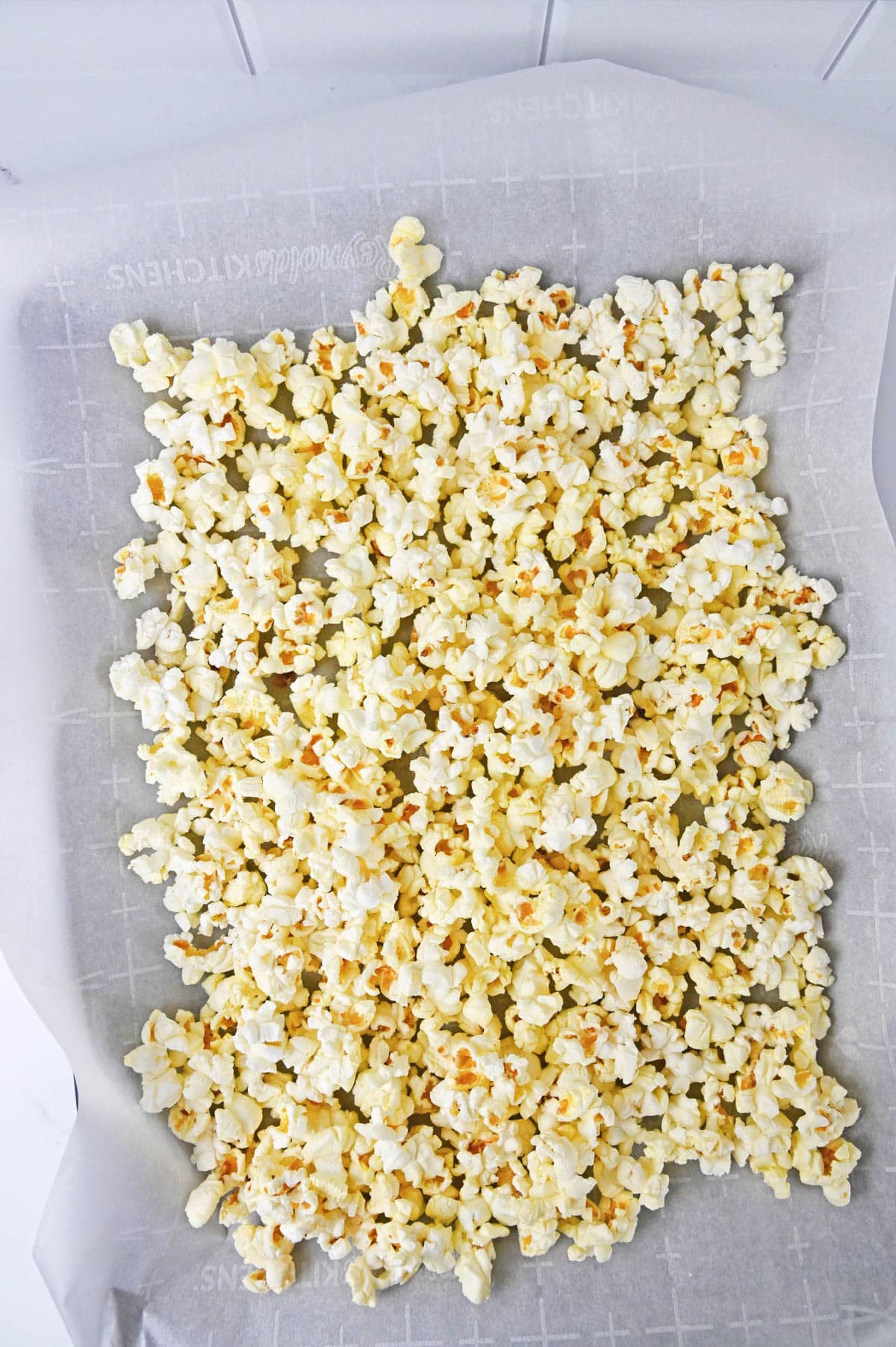 Popcorn spread out in a pan