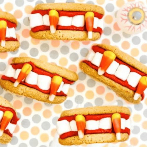 A group of cookies with candy canes on them.