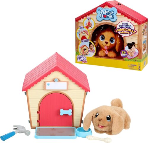 A toy dog house with a puppy inside.