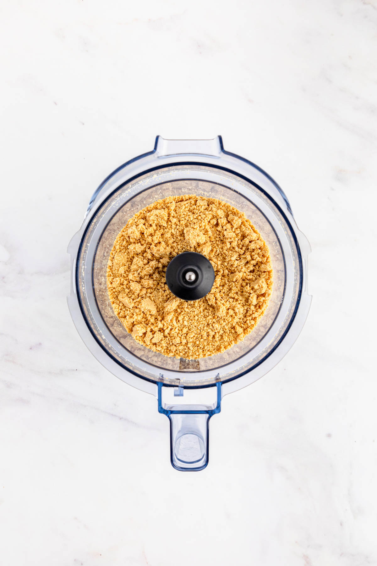 A food processor with Oreo crumbs