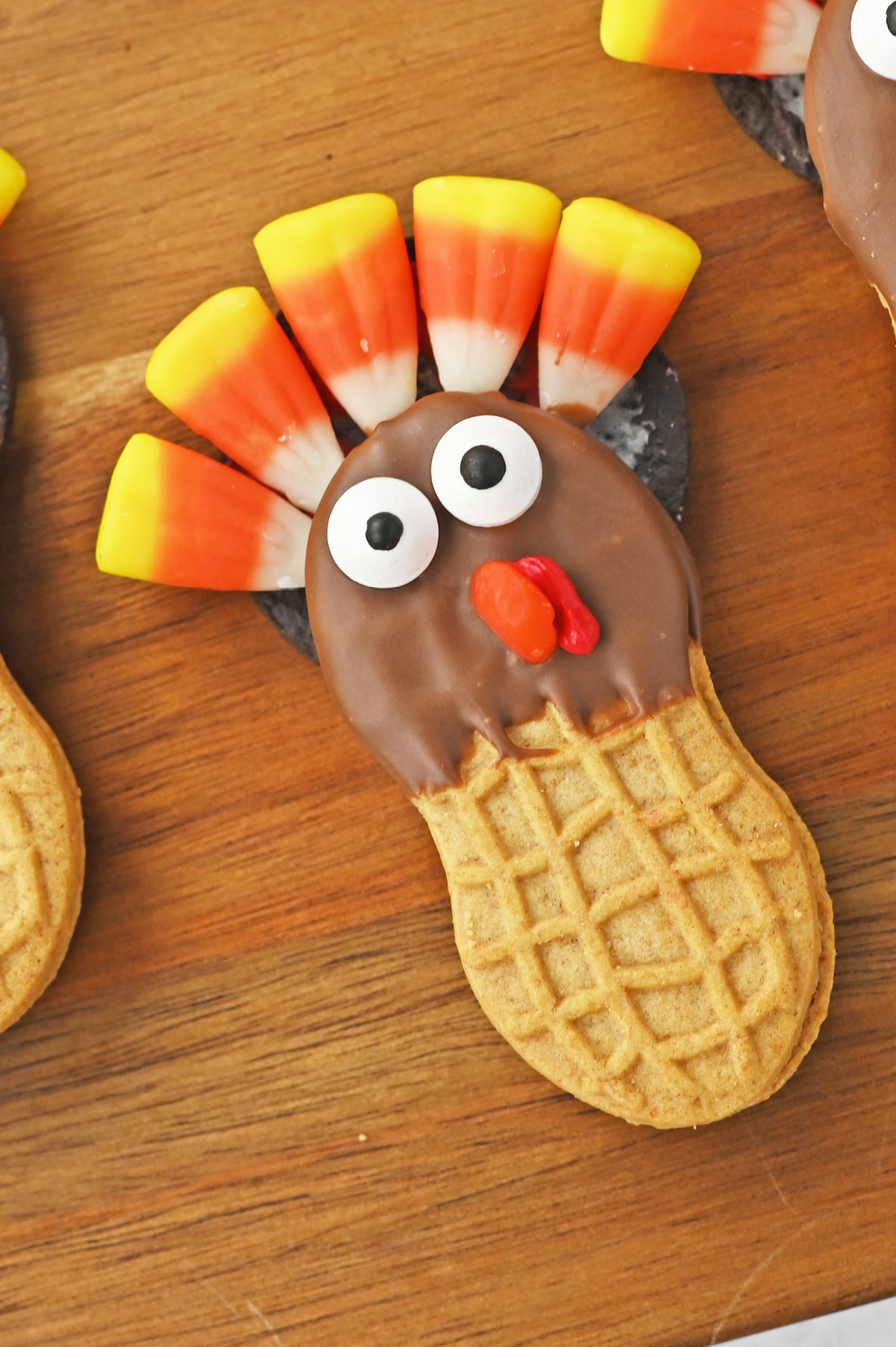 A group of thanksgiving cookies decorated like turkeys.