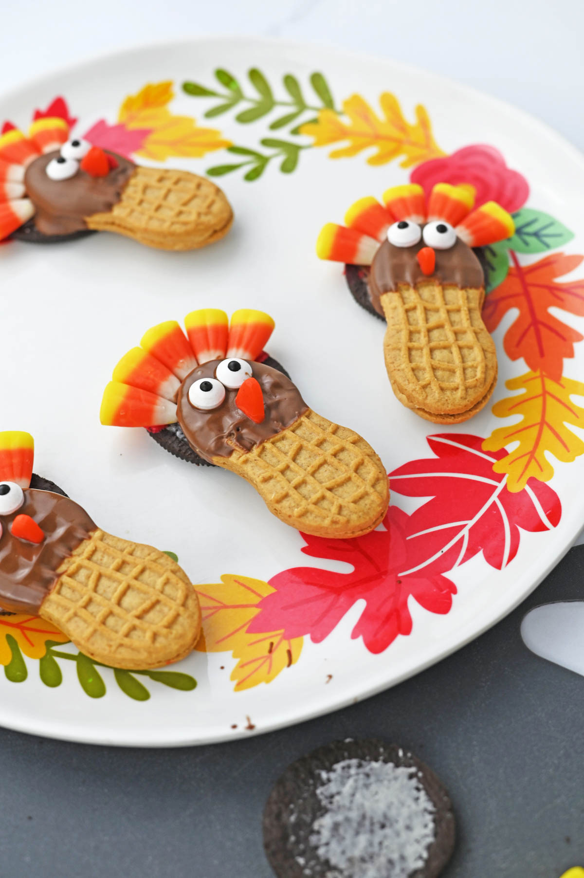 Thanksgiving turkey cookies on a plate.