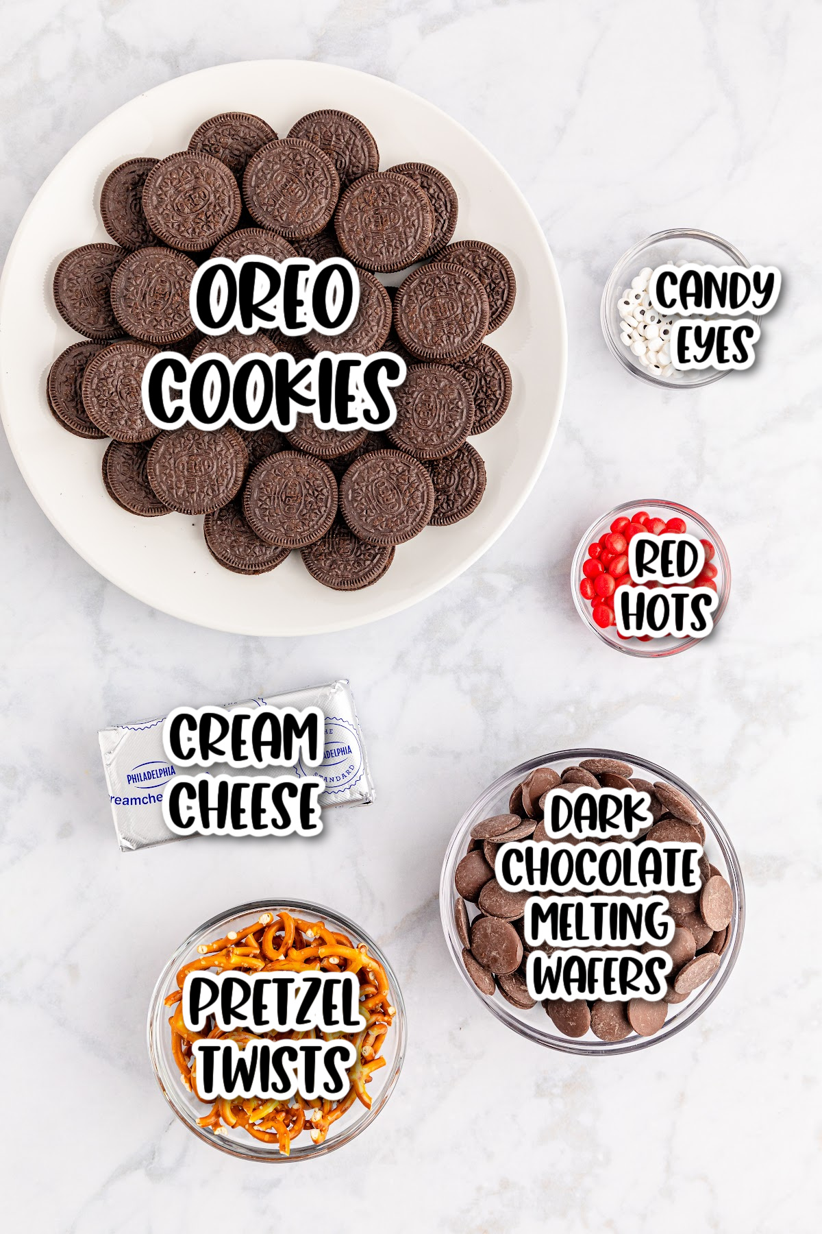 Oreo cookie ingredients on a white plate.