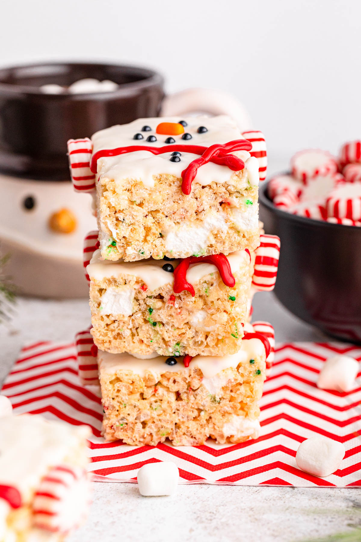 Christmas rice krispie treats stacked on top of each other.