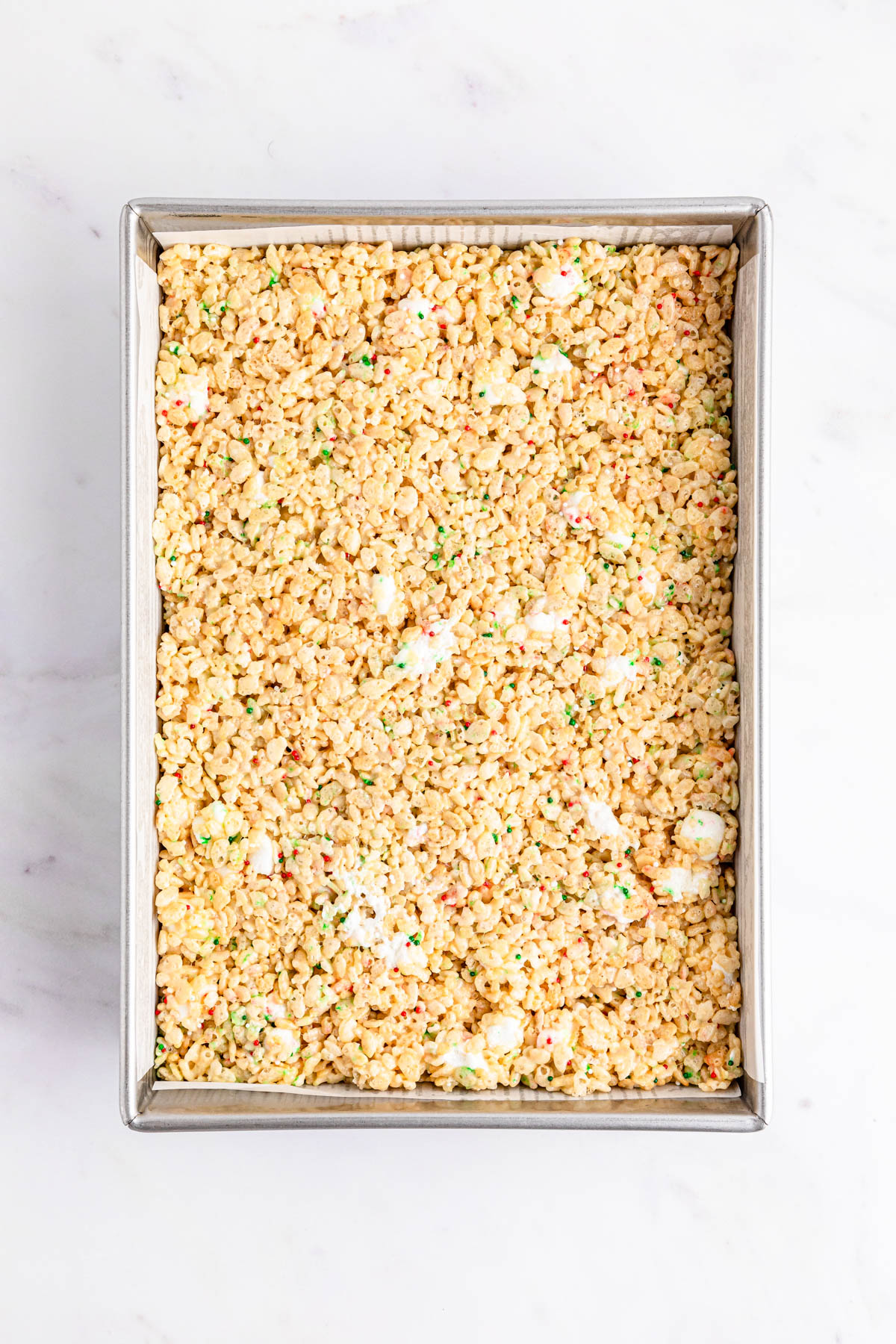 A baking pan filled with Rice Krispie Treats