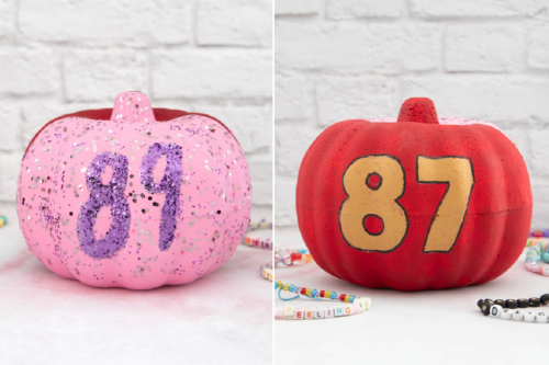 Two pumpkins with numbers painted on them.