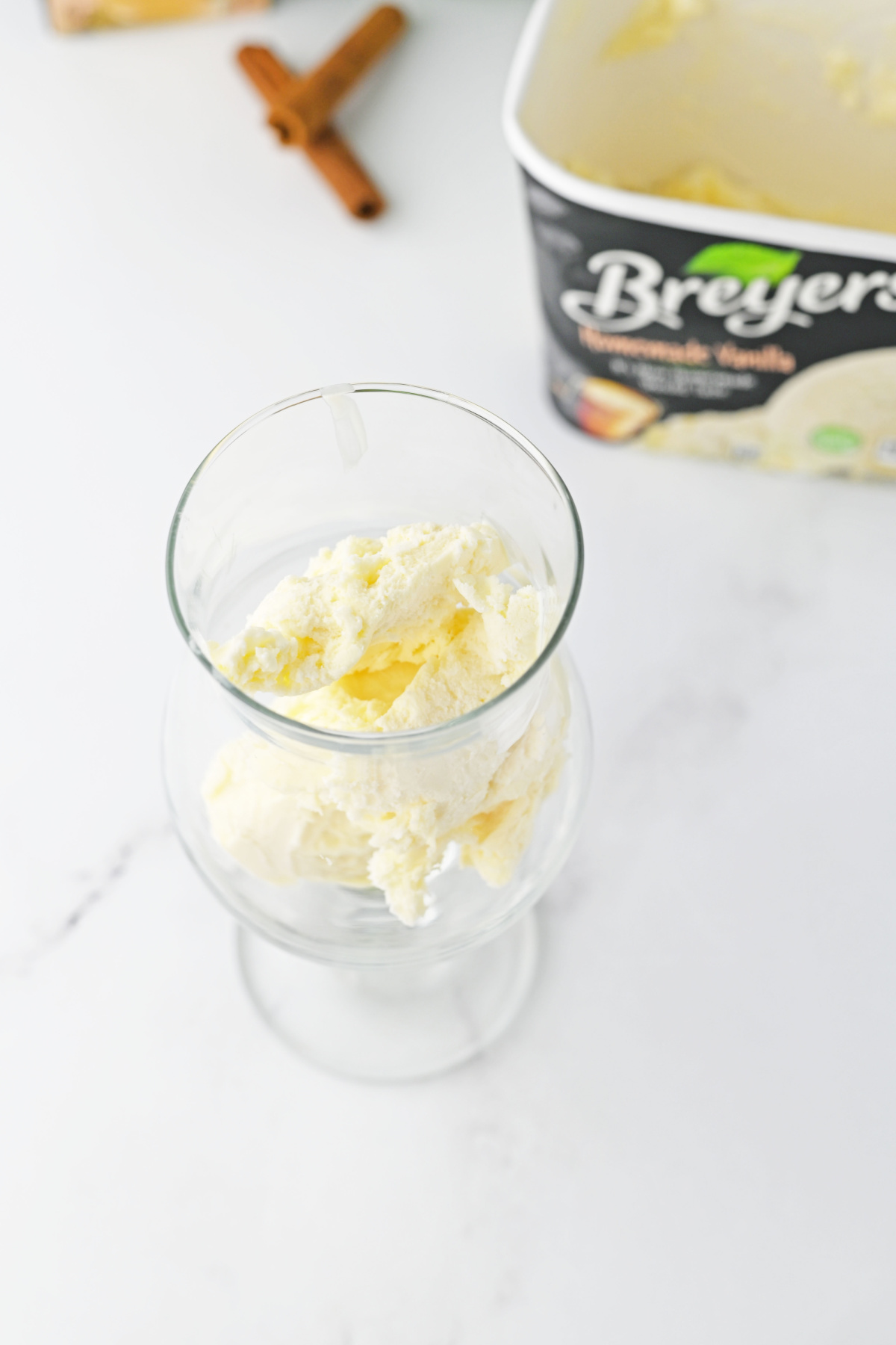 Breyer's vanilla ice cream in a glass.