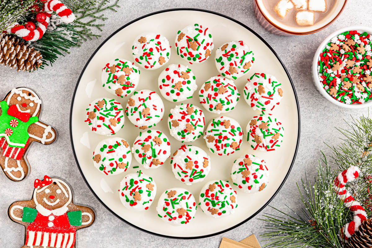 Christmas truffles with sprinkles on a plate.