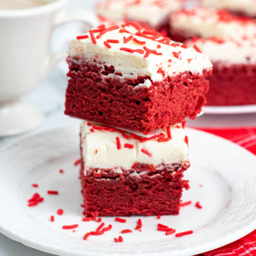 Red velvet brownies with cream cheese frosting.