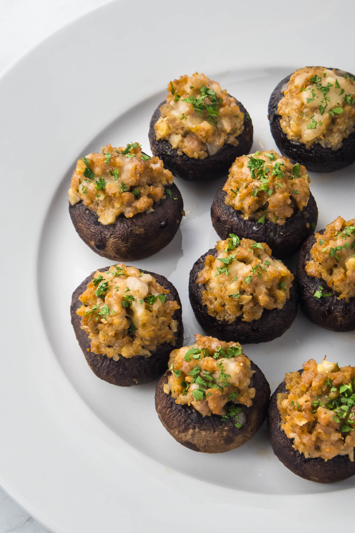Stuffed mushrooms with sausage and parsley.