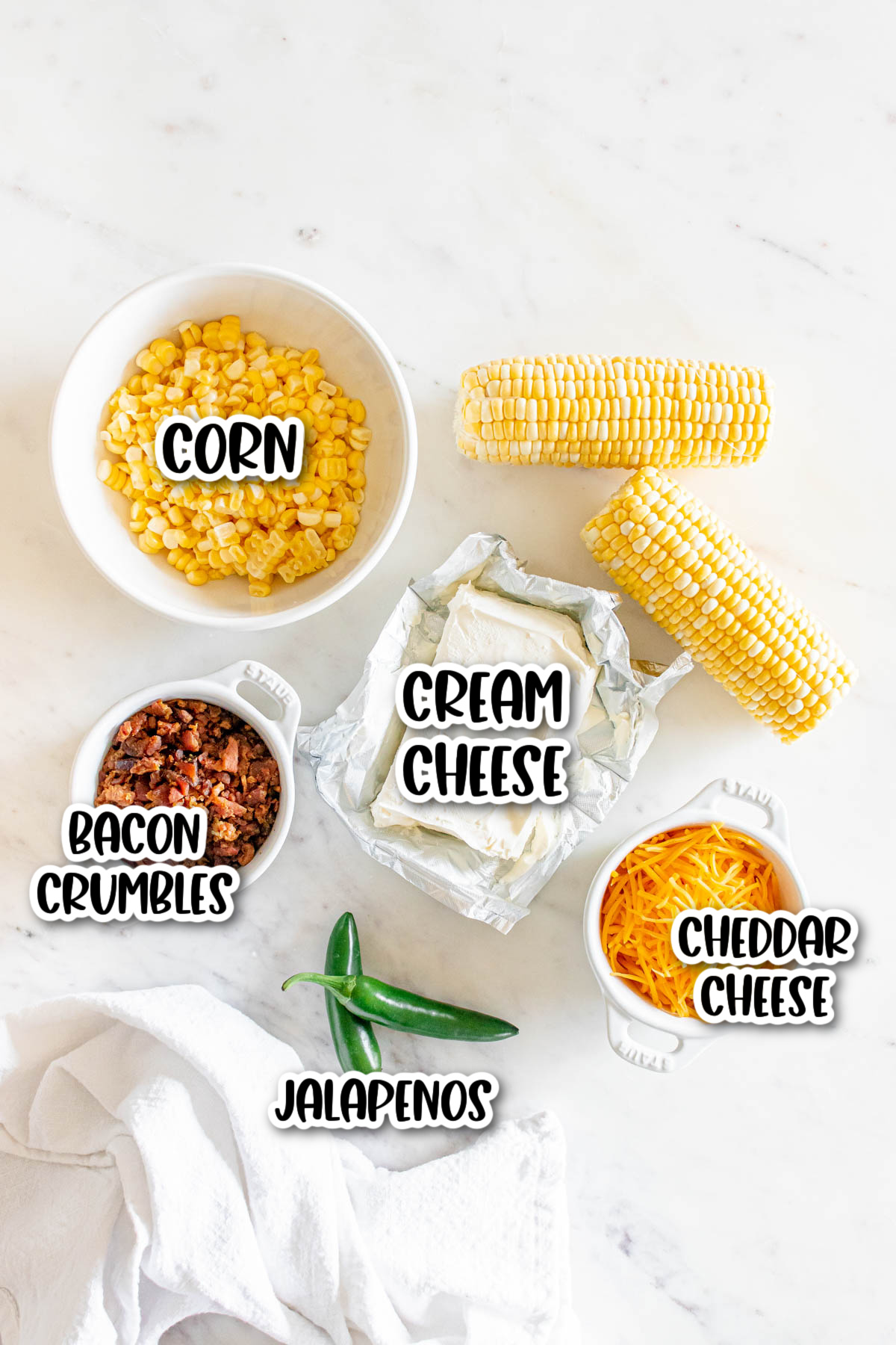 The ingredients for a cheesy corn dip